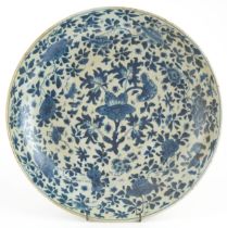 Chinese blue and white porcelain charger hand painted with flowers amongst foliage, 35.5cm in