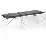 Travelling folding massage table with black leatherette upholstery, 74cm H x 185cm W x 62cm D :