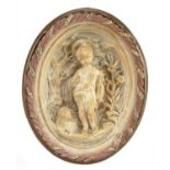 19th century religious interest plaster plaque decorated in relief with Putti with sheep,