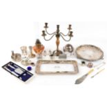 19th century and later metalware including a four footed salver, cruet set, engine turned cup with