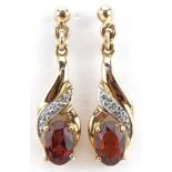 Pair of 9ct gold garnet and diamond drop earrings, 2.2cm high, 1.5g : For further information on