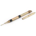 Two Victorian gold plated propelling pencils including one with black enamel, the largest 6cm in