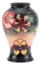 Moorcroft pottery baluster vase hand painted in the Oberon Honeysuckle pattern by Rachel Bishop,