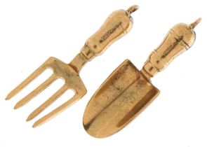 9ct gold gardening trowel and fork charms, the largest 2.5cm in length, total 1.7g : For further