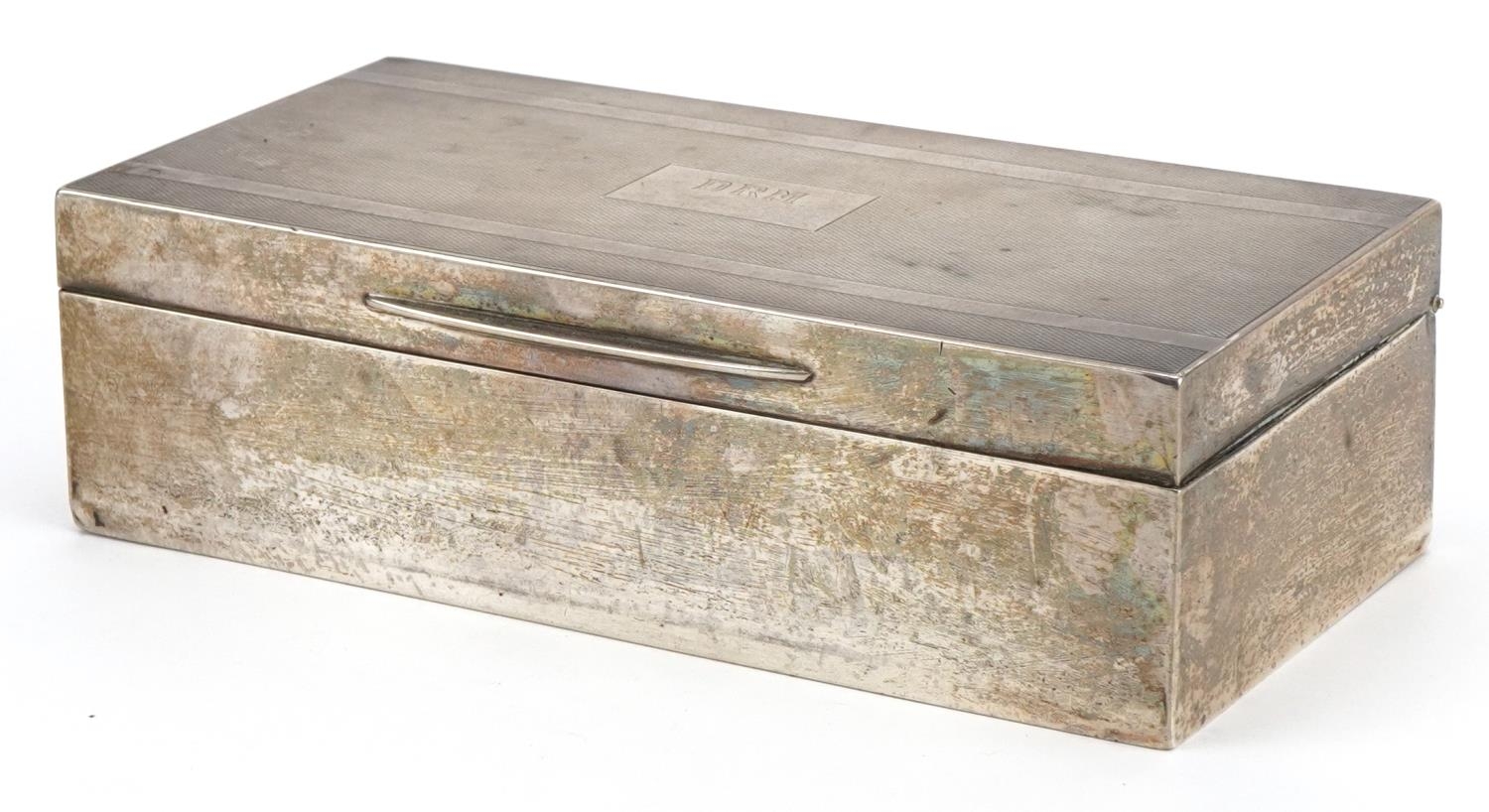 Padgett & Braham Ltd, Art Deco silver cigar box, the hinged lid with engine turned decoration,