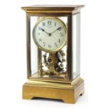 Eureka Clock Co Ltd of London, early 20th century brass cased four glass electric timepiece with