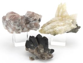 Three geology interest natural history mineral specimens including amethyst and quartz, the