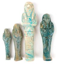 Four Egyptian style faience glazed ushabtis, the largest 19cm high : For further information on this