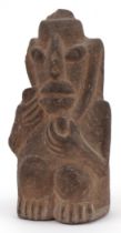 Antique Pre Columbian Aztec carved stone figure of a kneeling nude male, possibly volcanic stone,