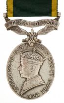 British military Territorial Army Long Service medal awarded to 7042604GNR.H.SHANLEY.R.A. : For
