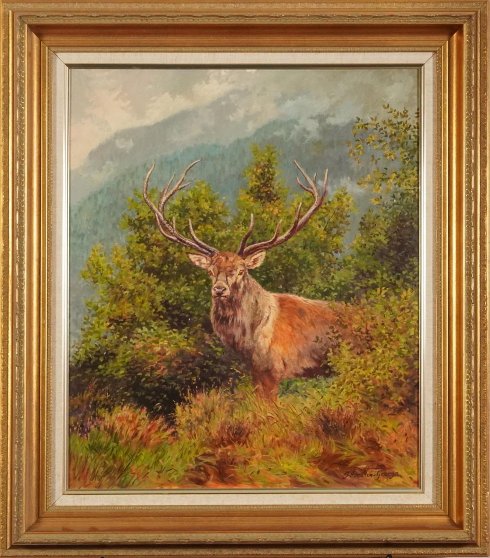 J Hamilton-George - Stag in a landscape, oil on canvas, mounted and framed, 60cm x 49.5cm - Image 2 of 5