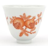 Chinese porcelain tea bowl hand painted in iron red with fruit and flowers, six figure iron red