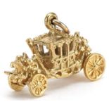 9ct gold coronation coach charm, 2.1cm in length, 3.1g : For further information on this lot