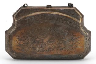 19th century heavy unmarked silver concertina purse profusely engraved with foliage, tests as