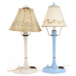 Two Art Deco plastic table lamps with shades including one hand painted with flowers, the largest