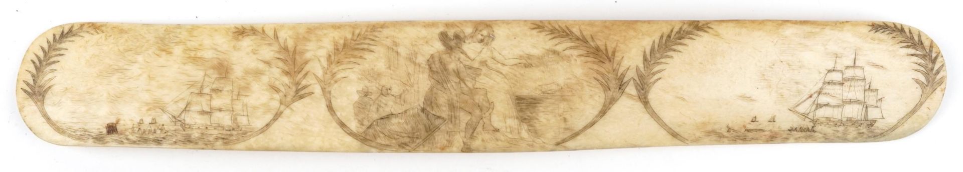 Antique sailor's scrimshaw whale bone page turner carved with figures and rigged ship, 36cm wide :