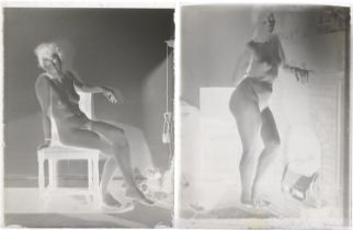 Two vintage black and white glass photographic slides of nude females, each 11cm x 8.5cm : For