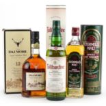 Four bottles of Scotch and Irish whisky with boxes comprising Old Bushmills 10 years old,