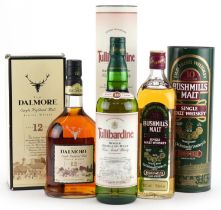 Four bottles of Scotch and Irish whisky with boxes comprising Old Bushmills 10 years old,