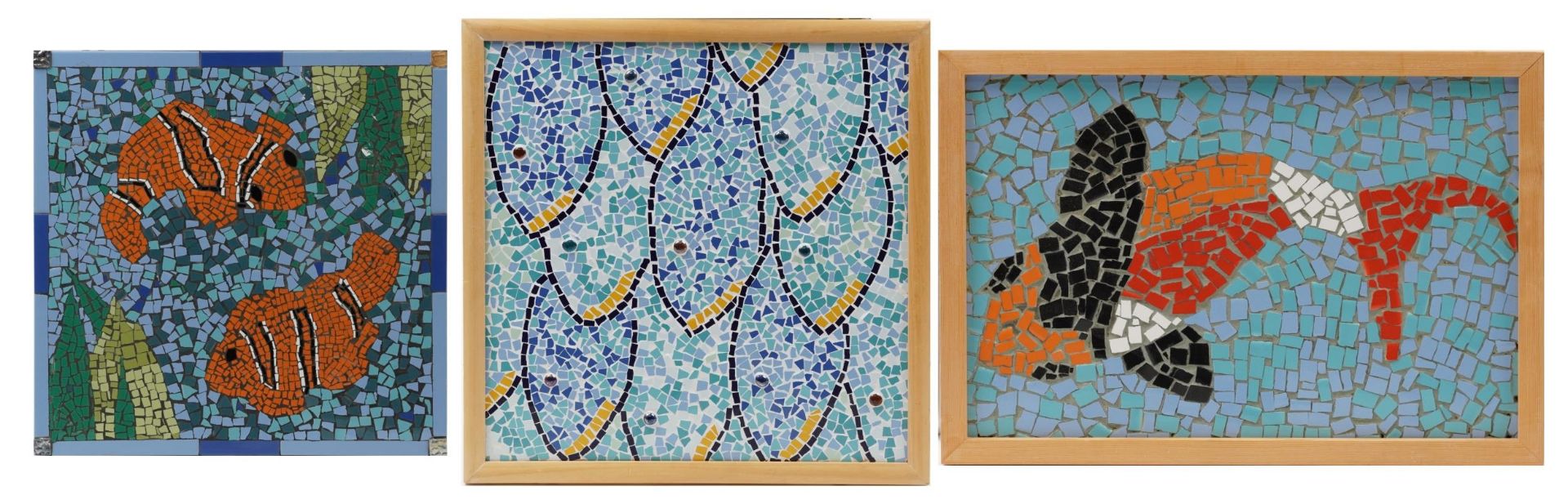 Three contemporary mosaic ceramic plaques of fish, one framed created by visually impaired ex-