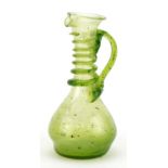 Roman style green glass ewer with trailed decoration, 15cm high : For further information on this