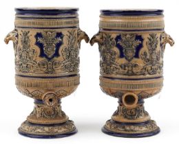 Royal Doulton, pair of Victorian salt glazed stoneware barrels with animalia handles decorated in