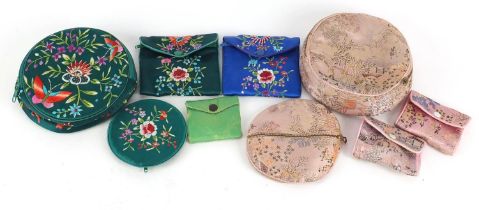 Nine Chinese jewellery cases including silk examples embroidered with flowers and butterflies :
