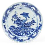 Chinese blue and white porcelain shallow dish hand painted with a falcon amongst flowers and