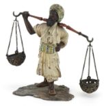 Attributed to Franz Xaver Bergmann, 19th century Austrian cold painted bronze street trader with two