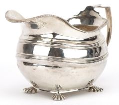 George III silver cream jug, indistinct hallmarks, possibly London 1809, 14.5cm in length, 178.