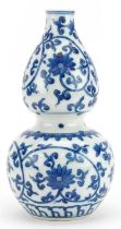 Chinese blue and white porcelain double gourd vase hand painted with flower heads amongst