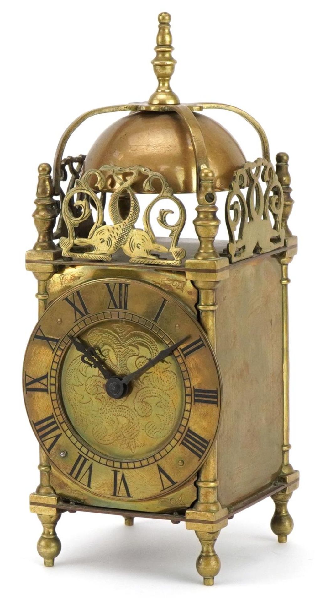 18th century style brass lantern clock having a circular dial with Roman numerals, 25.5cm high : For