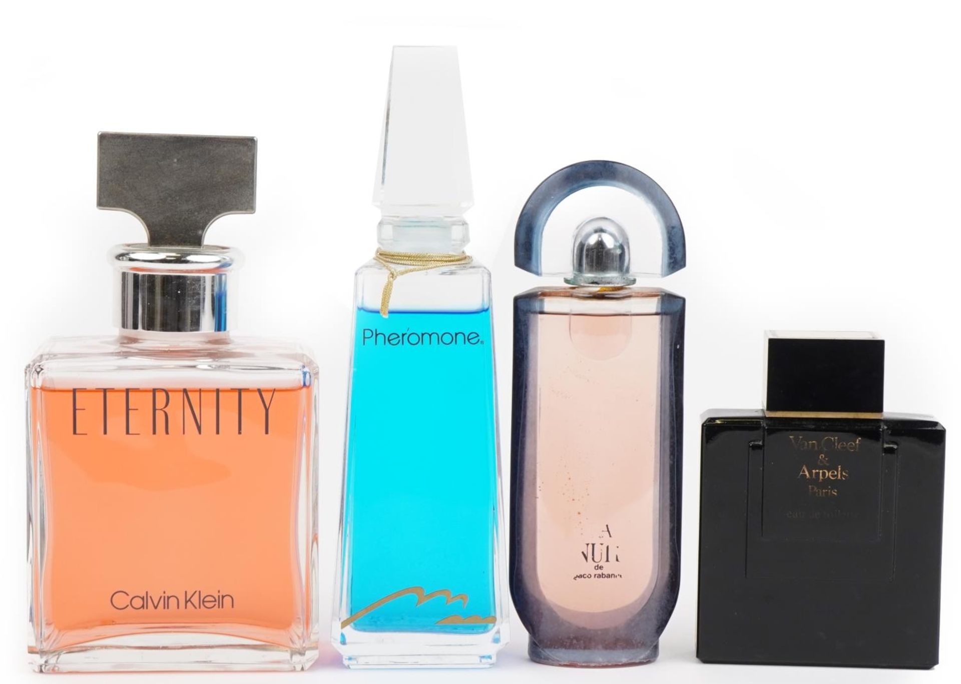 Four shop dummy display scent bottles comprising Van Cleef & Arpels, Calvin Klein Eternity, Paco