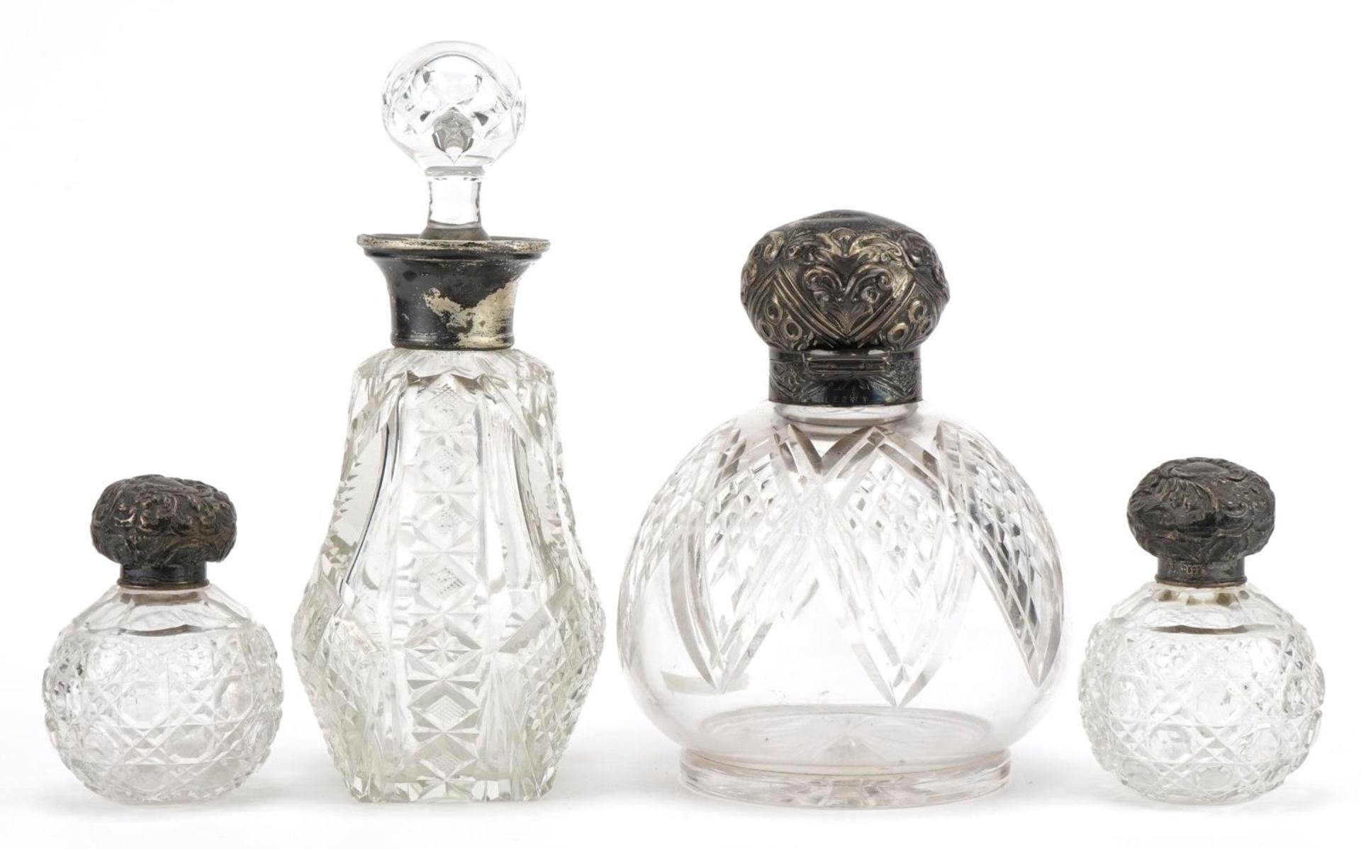 Four Victorian and later cut glass scent bottles with silver lids and mounts, the largest 17cm - Image 2 of 6