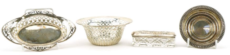 Silver objects comprising silver topped rectangular glass box and three dishes, two with pierced