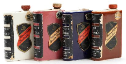 Four W R Paterson spirit rum decanters in the form of books, each 10cm high : For further