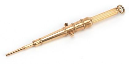 Victorian unmarked gold propelling pencil in the form of a cannon barrel, retailed by W S Hicks, 5cm