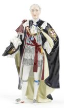 Early 20th century German hand painted porcelain figure of a gentleman wearing The Order of the