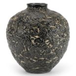 Chinese porcelain vase having a black glaze profusely decorated in relief with dragons amongst