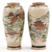 Pair of Japanese Satsuma pottery vases finely decorated with landscapes, character mark to the base,