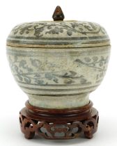 Asian porcelain Sawankhalok box and cover on hardwood stand hand painted with flowers, overall