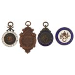 Four early 20th century jewels and lapels including Retired Police Officers National Association and