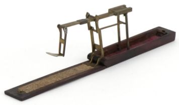 Set of Georgian mahogany brass folding sovereign scales, 14cm in length when closed : For further