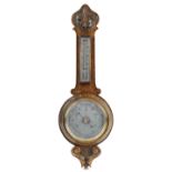 Carved oak wall aneroid barometer with thermometer having silvered dials, 67cm high : For further