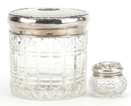 Two cut glass jars with silver lids including a tissue jar, the largest Birmingham 1942, 7.5cm