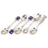 Sporting interest teaspoons comprising two silver golfing interest and three silver plated and