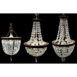 Three ornate brass bag chandeliers with cut glass drops including a pair, the pair each 38cm