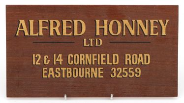 Vintage mahogany and gilt letter advertising sign for Alfred Honney Limited, 12 & 14 Cornfield Road,