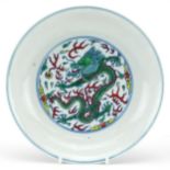 Chinese porcelain doucai dish hand painted with dragons amongst clouds, six figure character marks