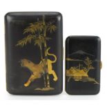 Two Japanese damascene Komai style cigarette cases including one inlaid with a mountain lion,